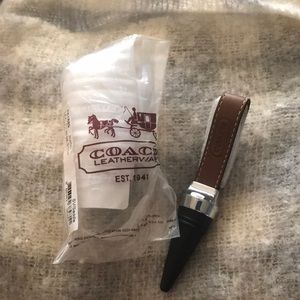 Coach leather wine stopper